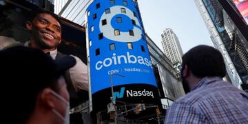 Coinbase shares fall after SEC warning on potential legal action