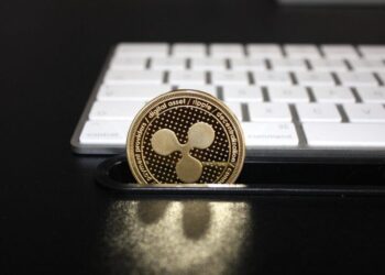 Institutional Investors Bet on $BTC and $XRP Investment Products as Trading Volumes Plunge