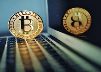 Bitcoin hits $70,000 for first time: A new era or speculative surge?