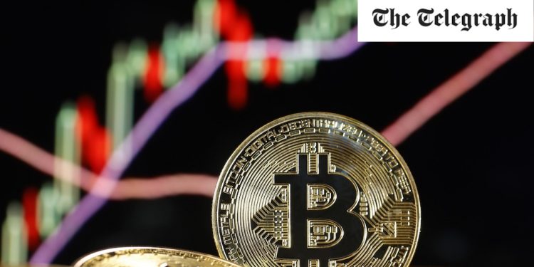 Bitcoin hits $70,000 in new record high